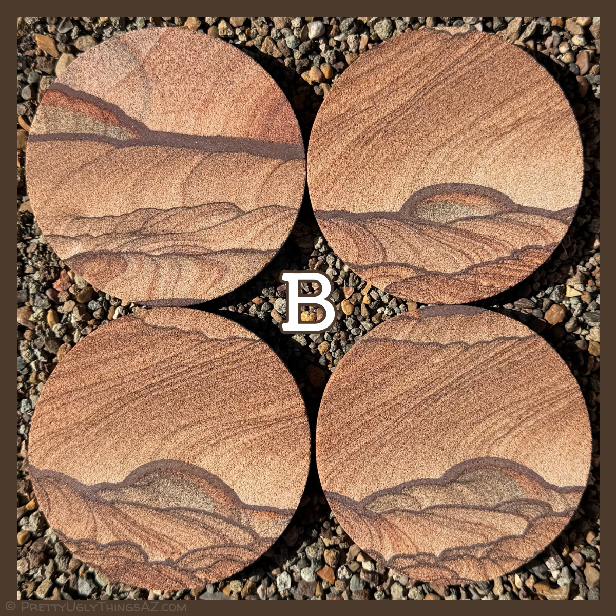 Option B, a set with a bold dark iron band through it, with sweeping thin layers above like a sky, and hill-like scallops and darker pattern below.