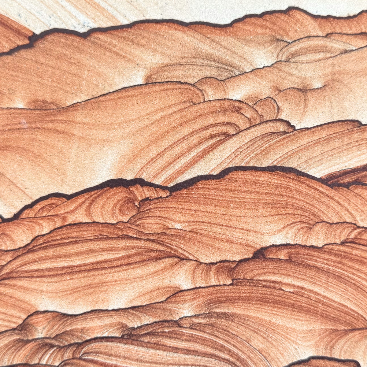 Close detail view of the surface of the slab, with focus on the hill-like layers. A bold dark iron band with scalloped form runs across the middle below the first hill, with slightly deeper red coloration making it appear more in the foreground.