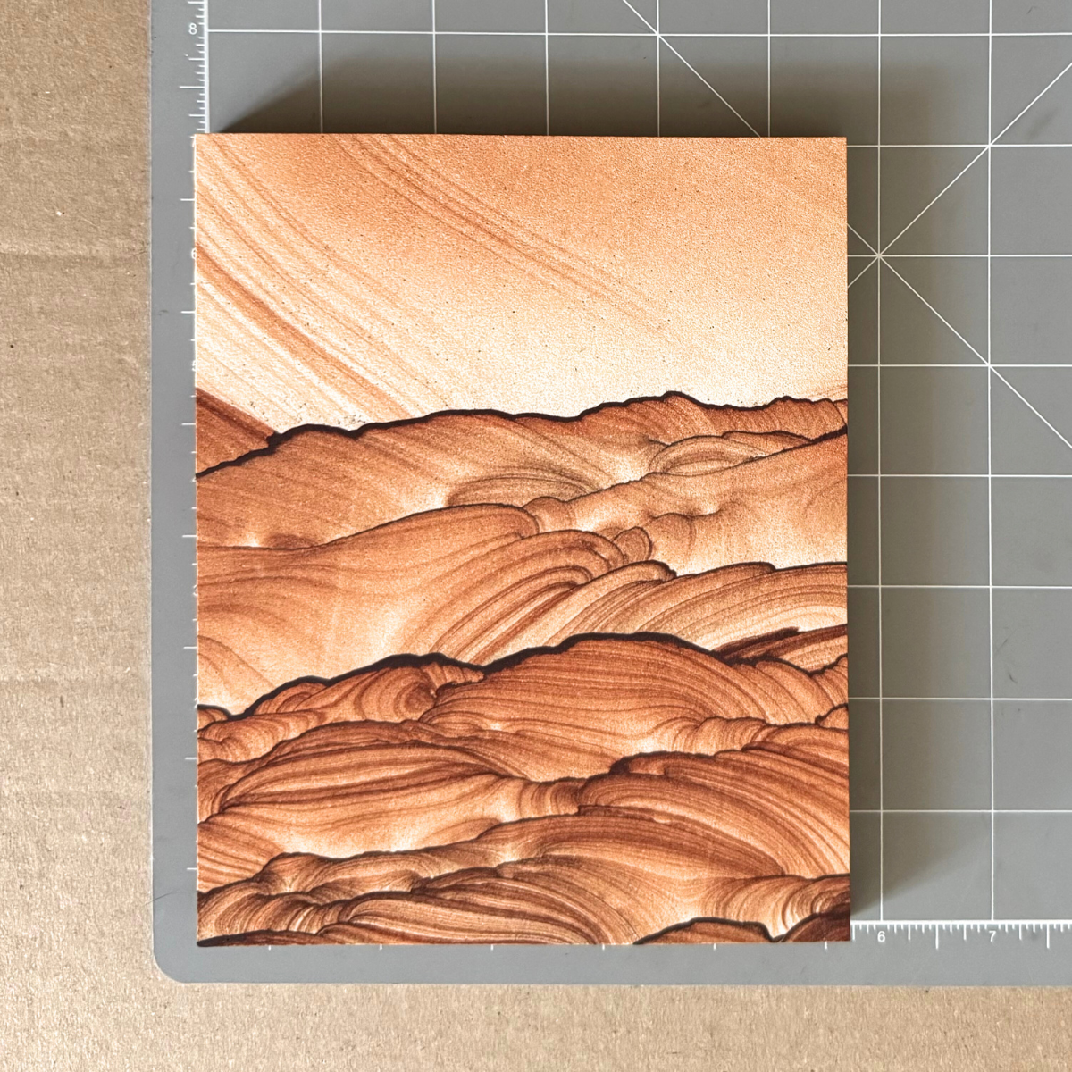 Scale image of the piece on a measuring mat, measuring about seven inches long and five and a half inches wide.