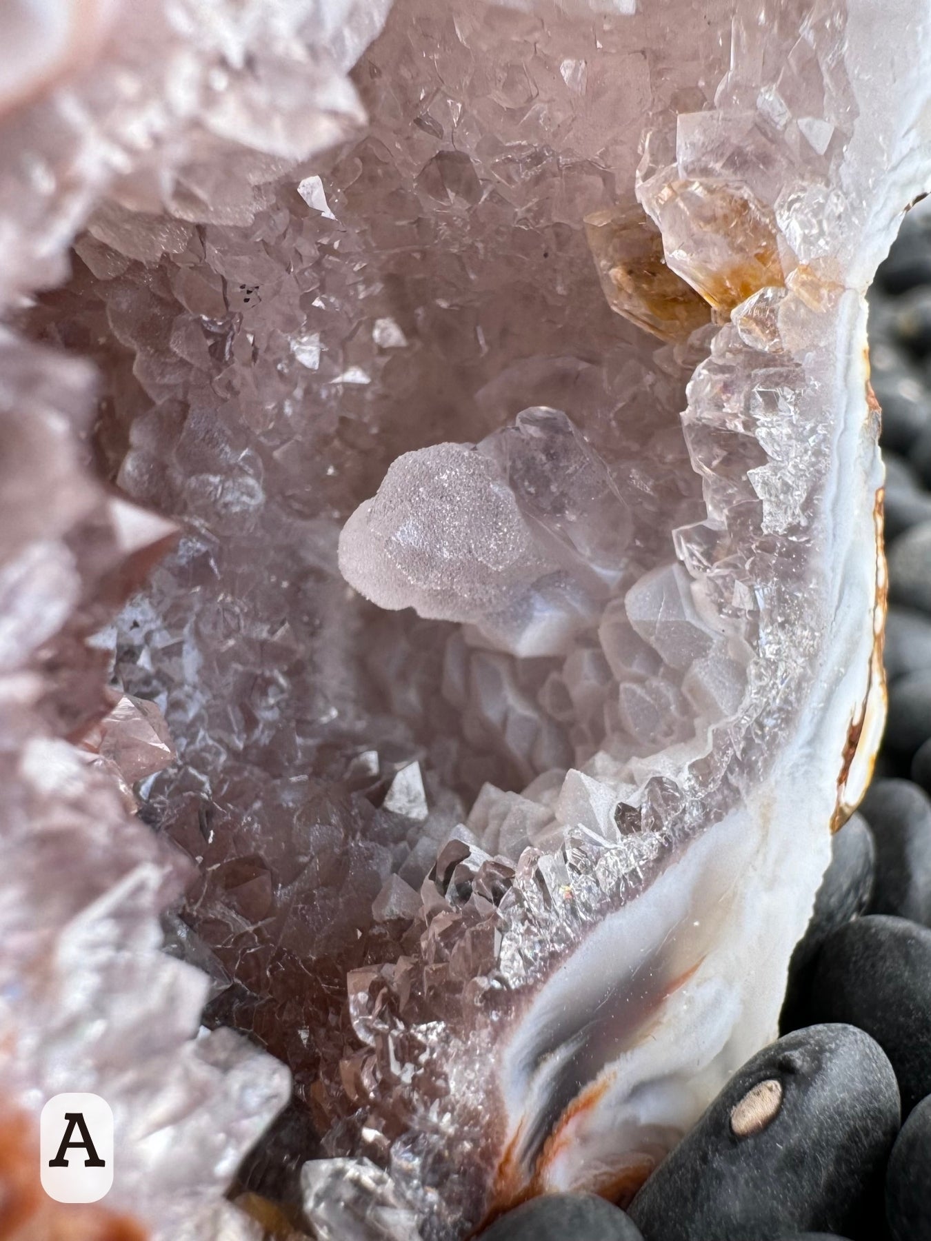 Option A: Detail of the larger quartz crystal among the druzy in the first half, coated with a sugary layer of growth.