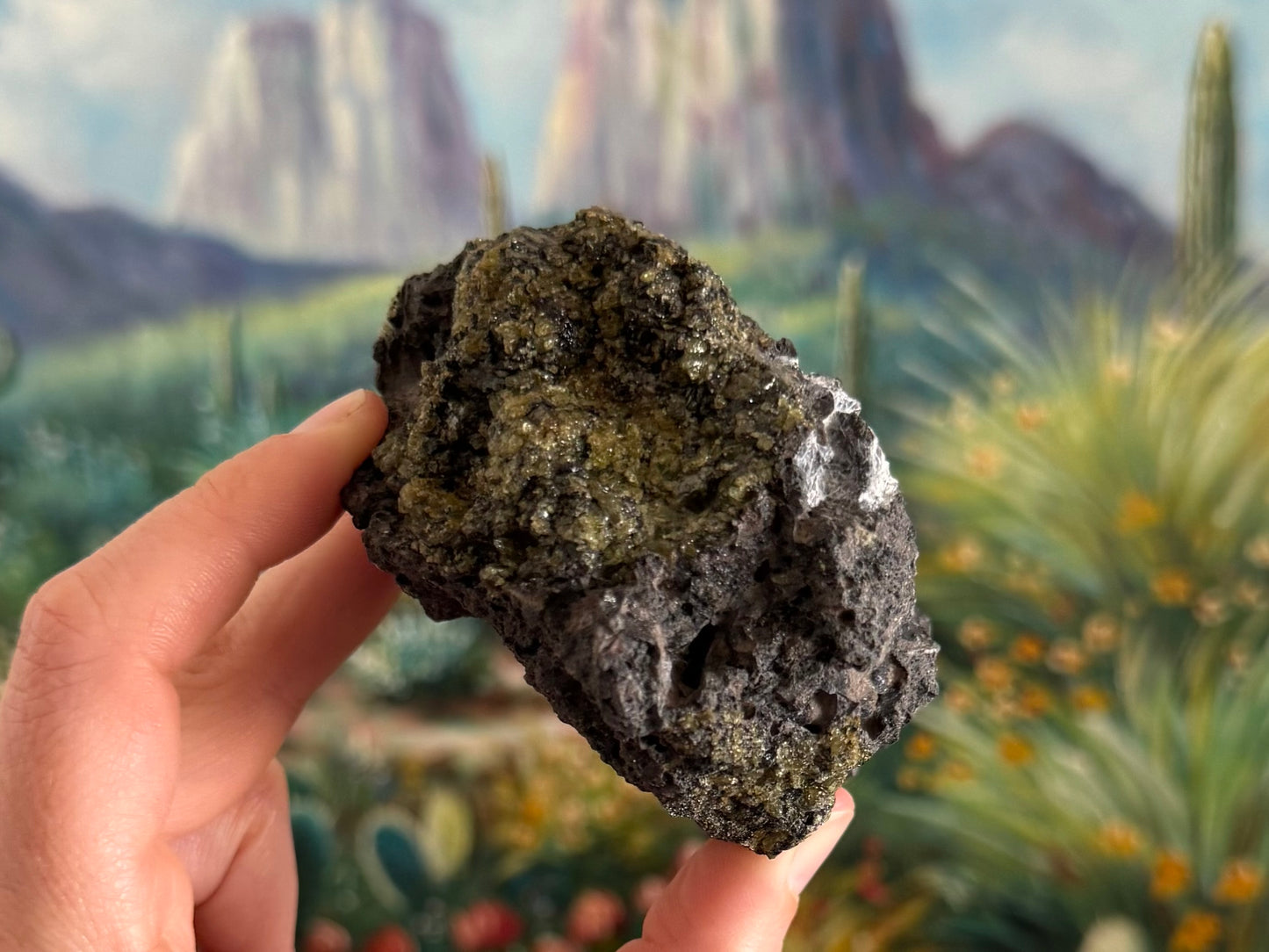 A side of the piece covered in a desaturated brownish peridotite.