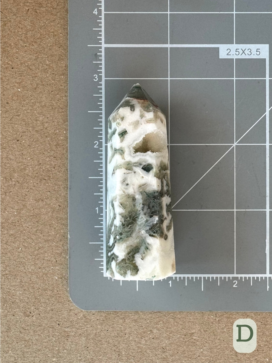 Option D, showing scale of two and three quarters inches on a measuring mat