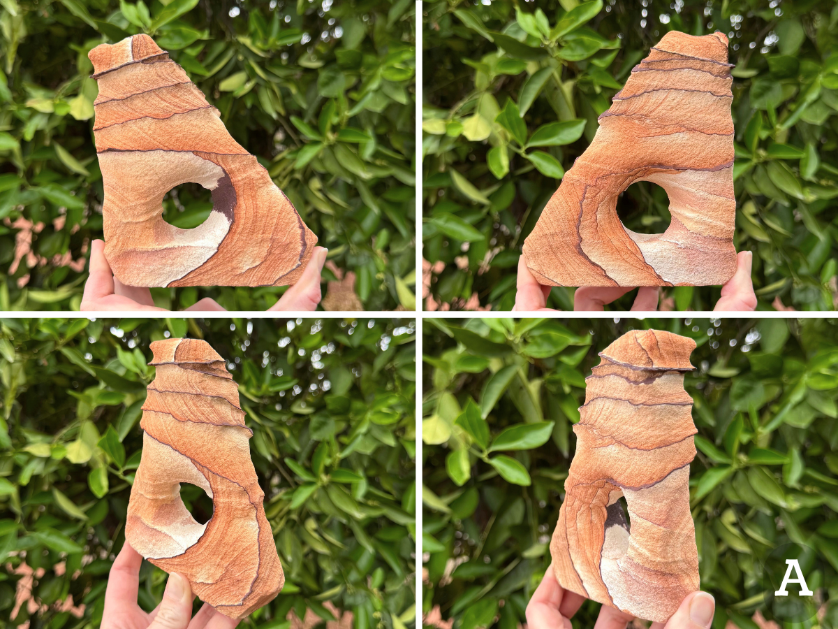 Option A, four views of a triangular arch with a right angle on one side, the shortest side forming the flat base of the piece. There is a round hole through the center. The piece has thin dark iron banding running through it, creating horizontal ridges in the top half, and curving around the base. The sandstone is a light orange-red color with curved layering between iron bands. A lighter patch on the right-angle corner has subtle orange-cream and pink banding.