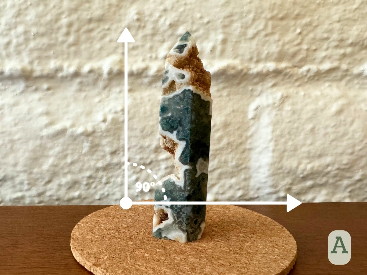 Option A, the tower on a flat surface with a right angle showing it has a decent lean