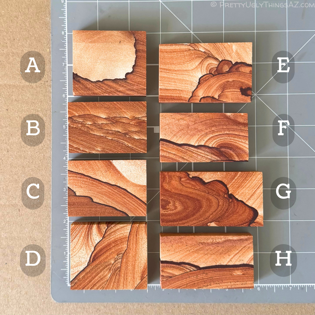 Options A through H on a measuring mat, in order in two columns from the upper left to bottom right. The pieces are all rectangular, most about twice as long as they are wide. Option G is more elongated, option A is close to square, and options C and D are closer to a three to four ratio size.