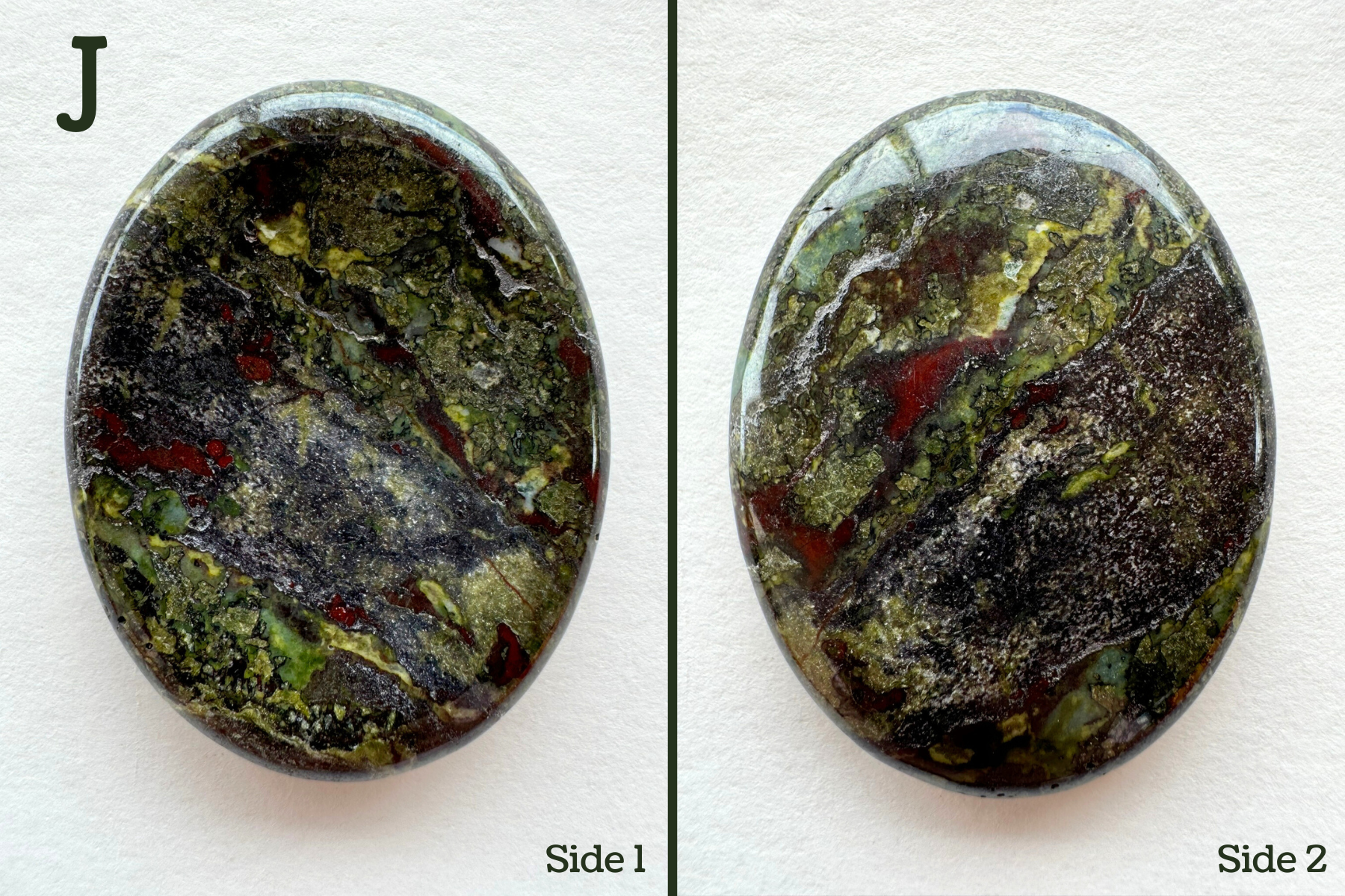 Option J, with streaky coloration at diagonal across the piece. It has grainy dark gray and white patches, with vivid lime green ripples and red spots. There is some blue-green coloration to the lime-green spots in places.