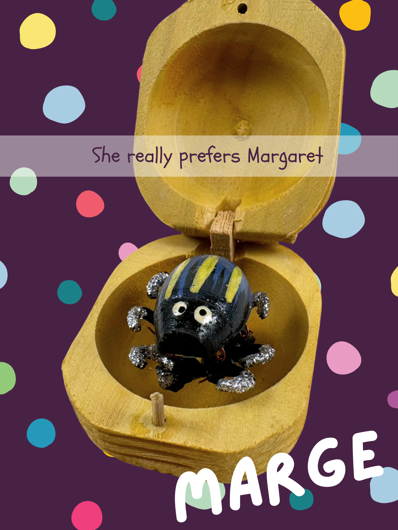 A blue bug with black and white stripes, named Marge and captioned "She really prefers Margaret"