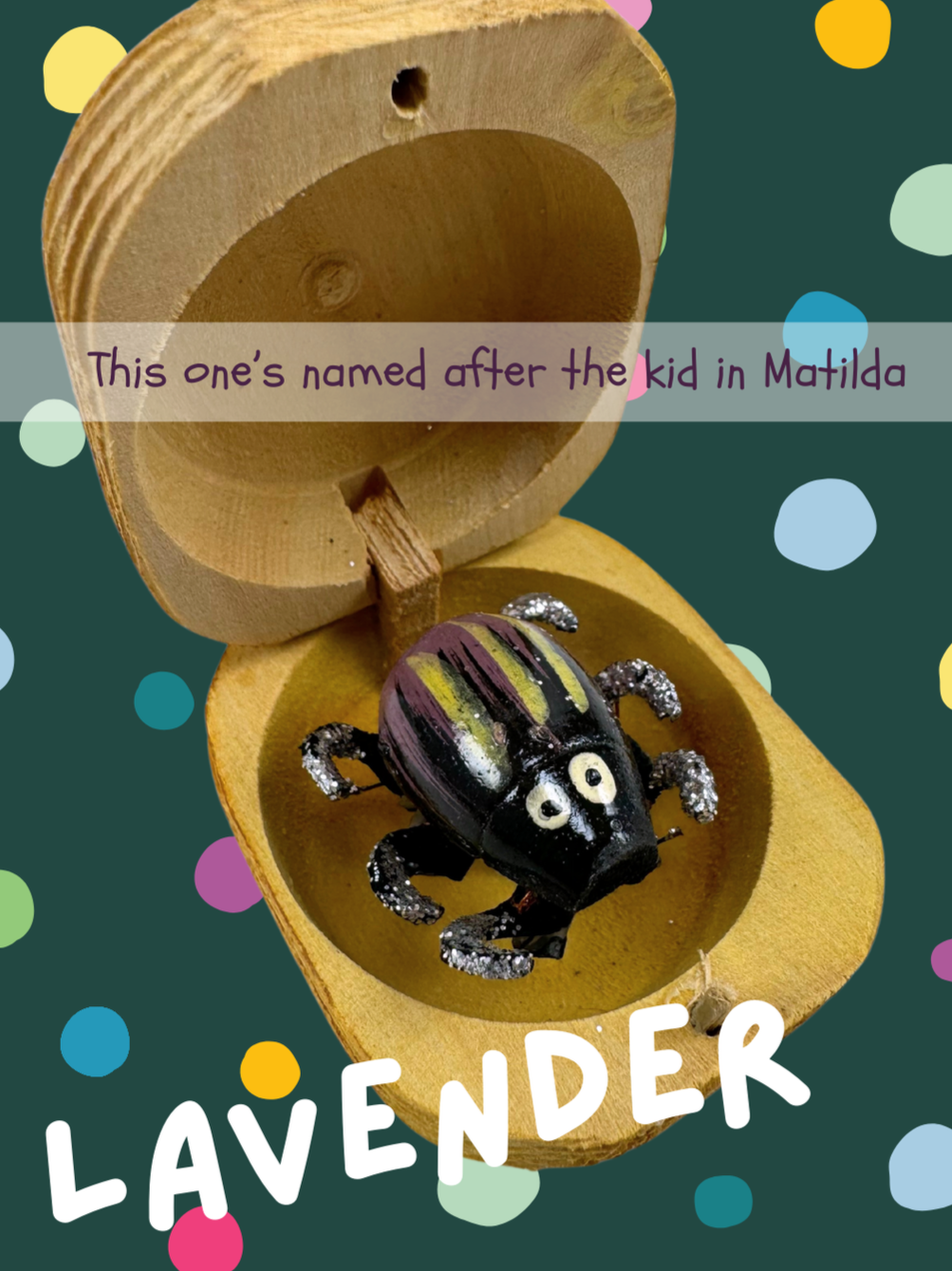 A mauve bug with black and white stripes, named Lavender and captioned "This one’s named after the kid in Matilda"