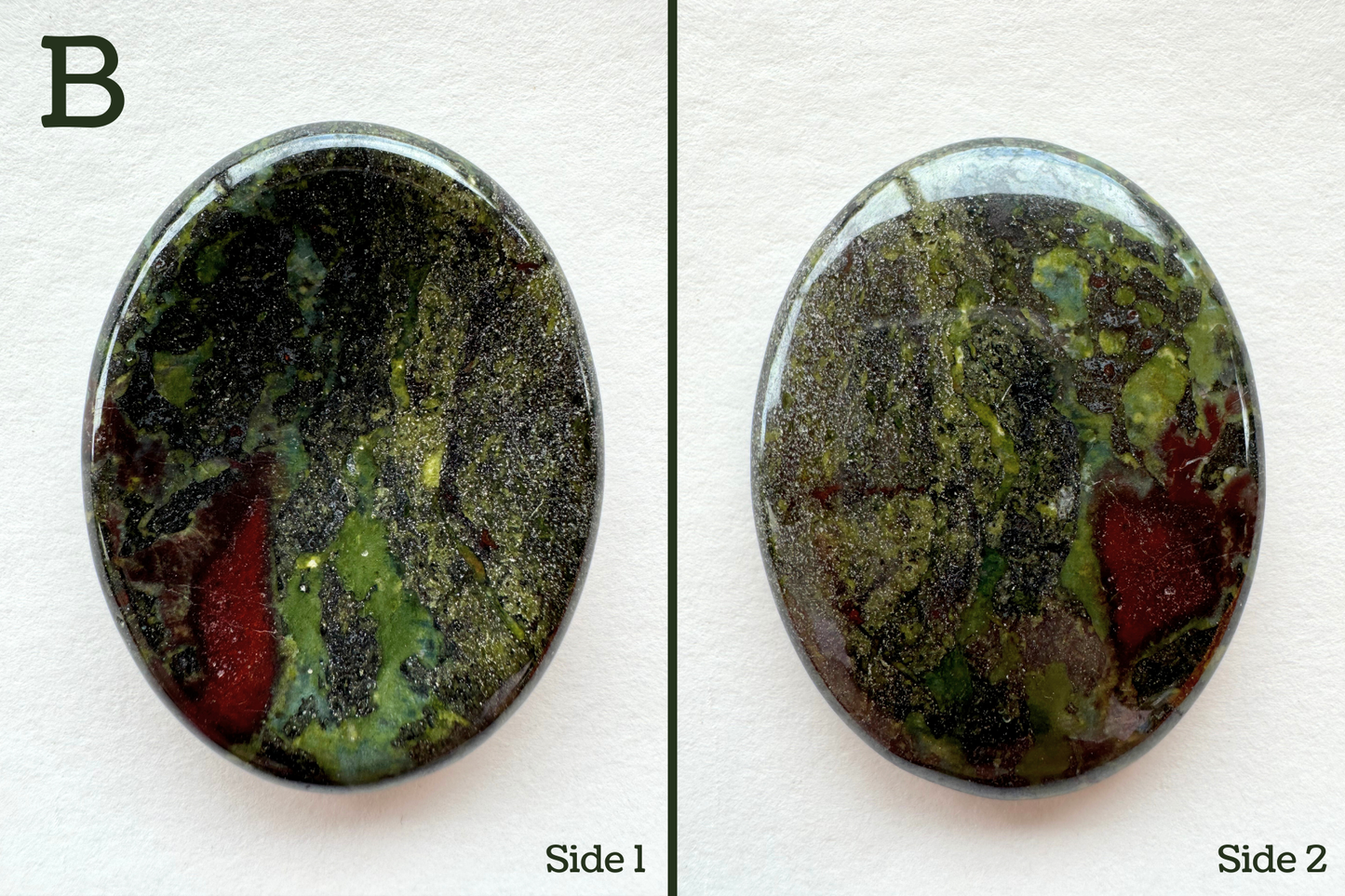 Option B, a grainy olive green with black and white spots in it. It has a large red spot on one edge, and chunky bluish-green and lime green splotching.