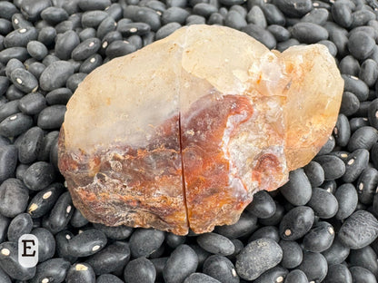 Option E, the geode composed showing the same coloration on the other side, with chalcedony separated into white on top and dark red-brown below