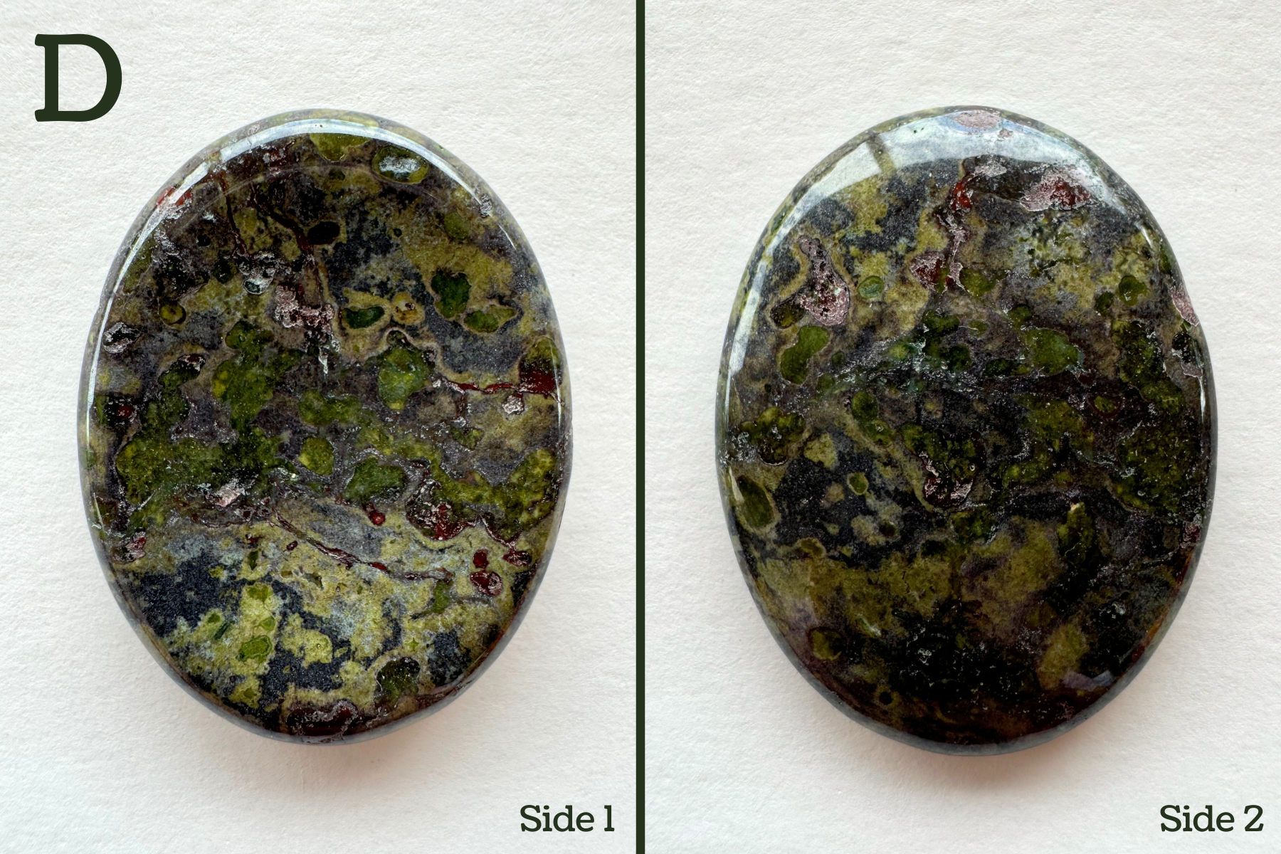 Option D, a dark gray base color heavily filled with with light and dark lime green spots, and a few small red spots in veins. Some veining is inverted into the surface.