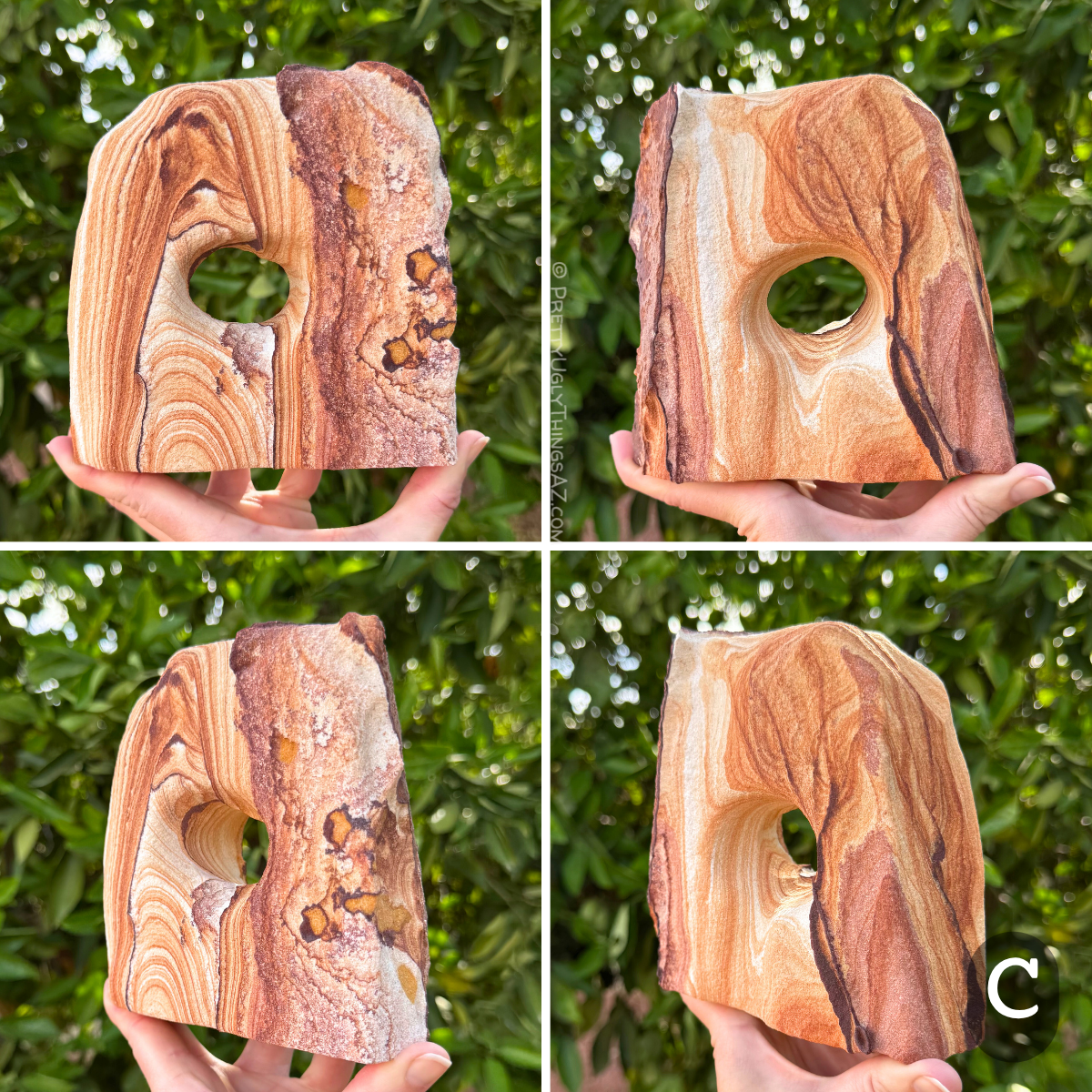 Option C, a blocky rounded off-square arch with an oval hole through the center. The piece has high-contrast pattern, with dark orange-brown layers looping across cream colored sandstone. One edge is near-white with splotchy dark purple-red iron pattern.  The other main face has simple, artistic orange, white, and dark purple pattern.