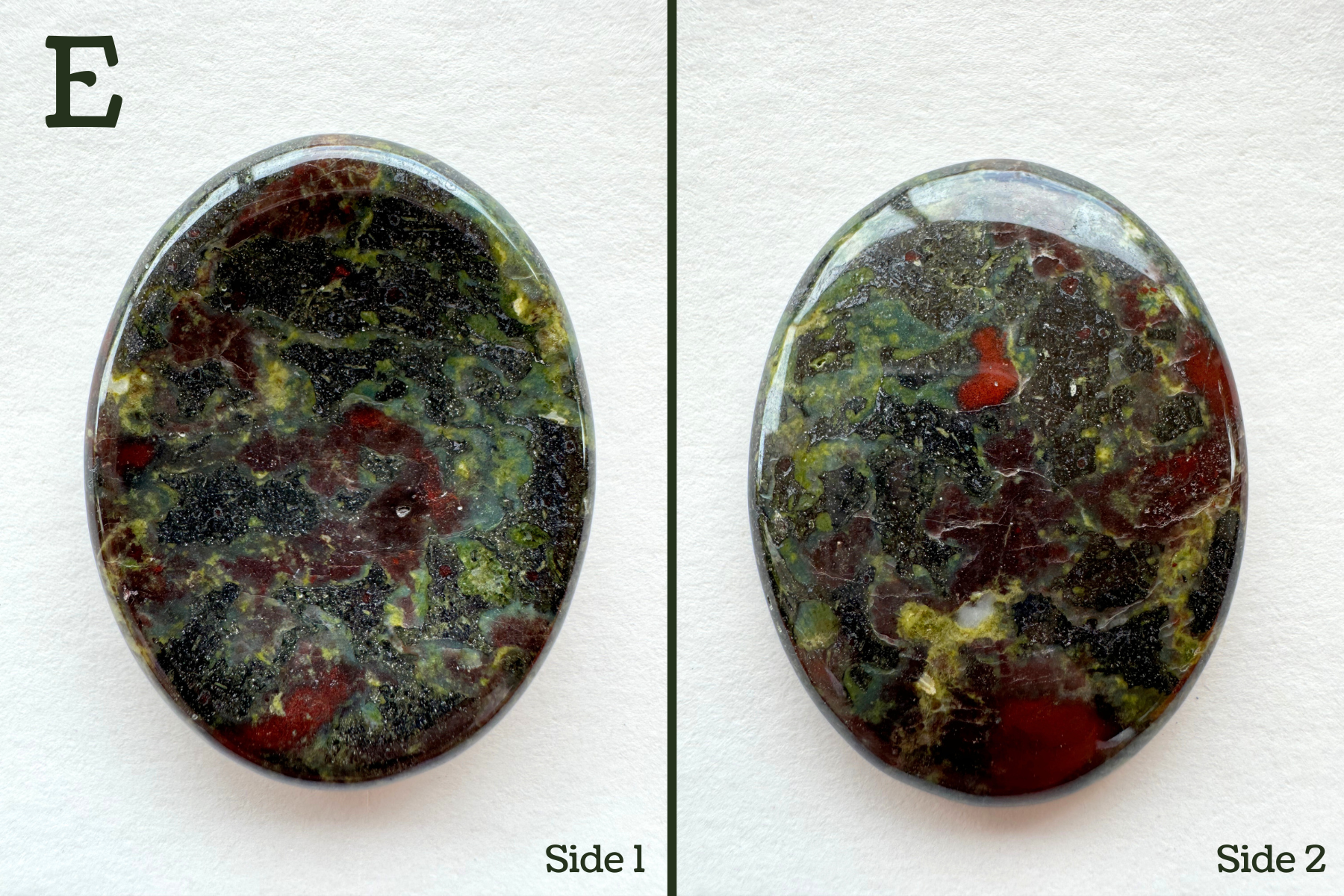 Option E, a dark grainy green-gray base color with lime green and red spots. The lime looks as though blue color is mixing into it. There is a white spot with yellow-green near it.