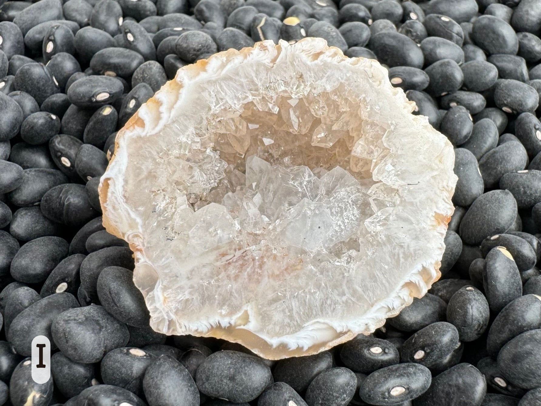 Option I: detail of the other half of the geode, lined with chunky colorless quartz crystals and a nice feather agate rim.