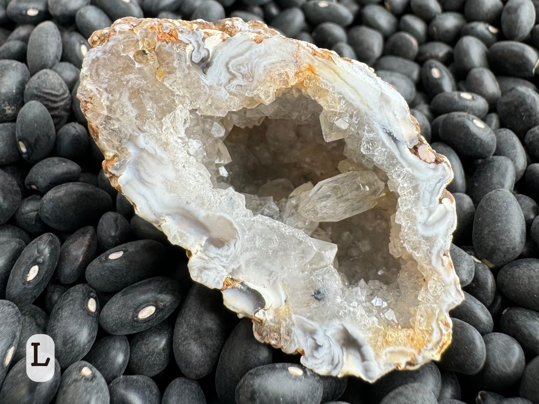 Option L: detail of the other half of the geode, with one well-formed larger quartz crystal inside