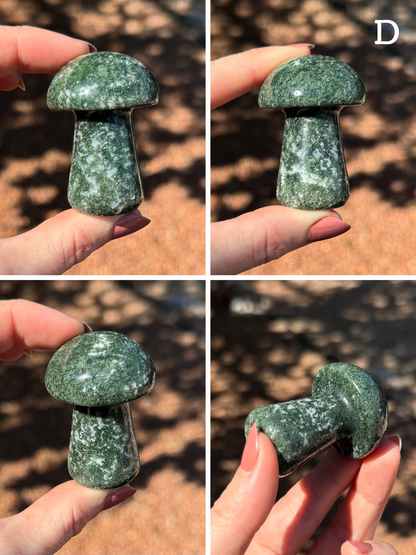 Option D, four views of as moss agate mushroom that it dark green with a small amount of white. The green is quite textured with swirling mossy patterns, and there is some pitting on the surface 