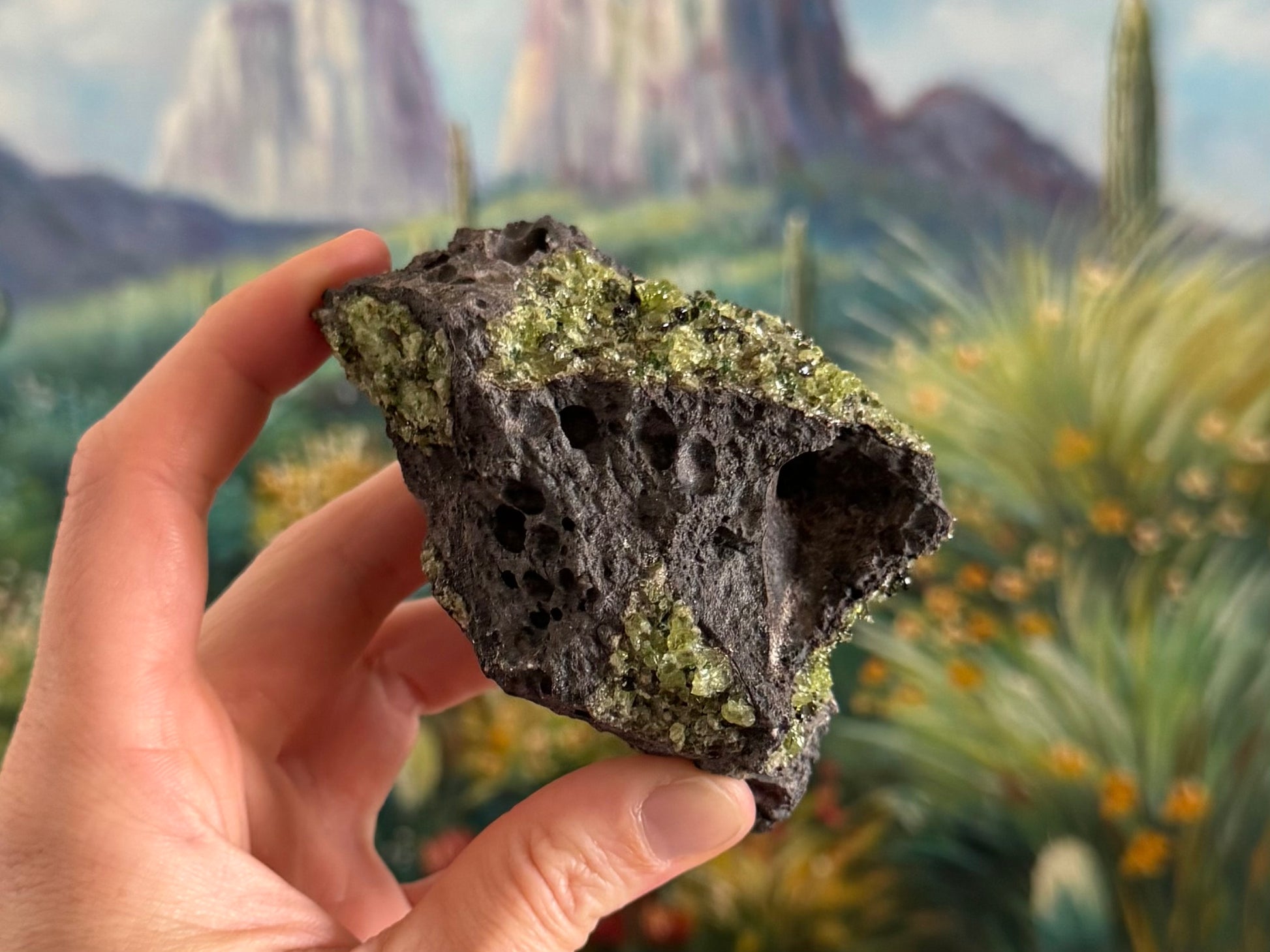 A triangular side of the piece with interesting large bubble holes, and angular patches of peridotite