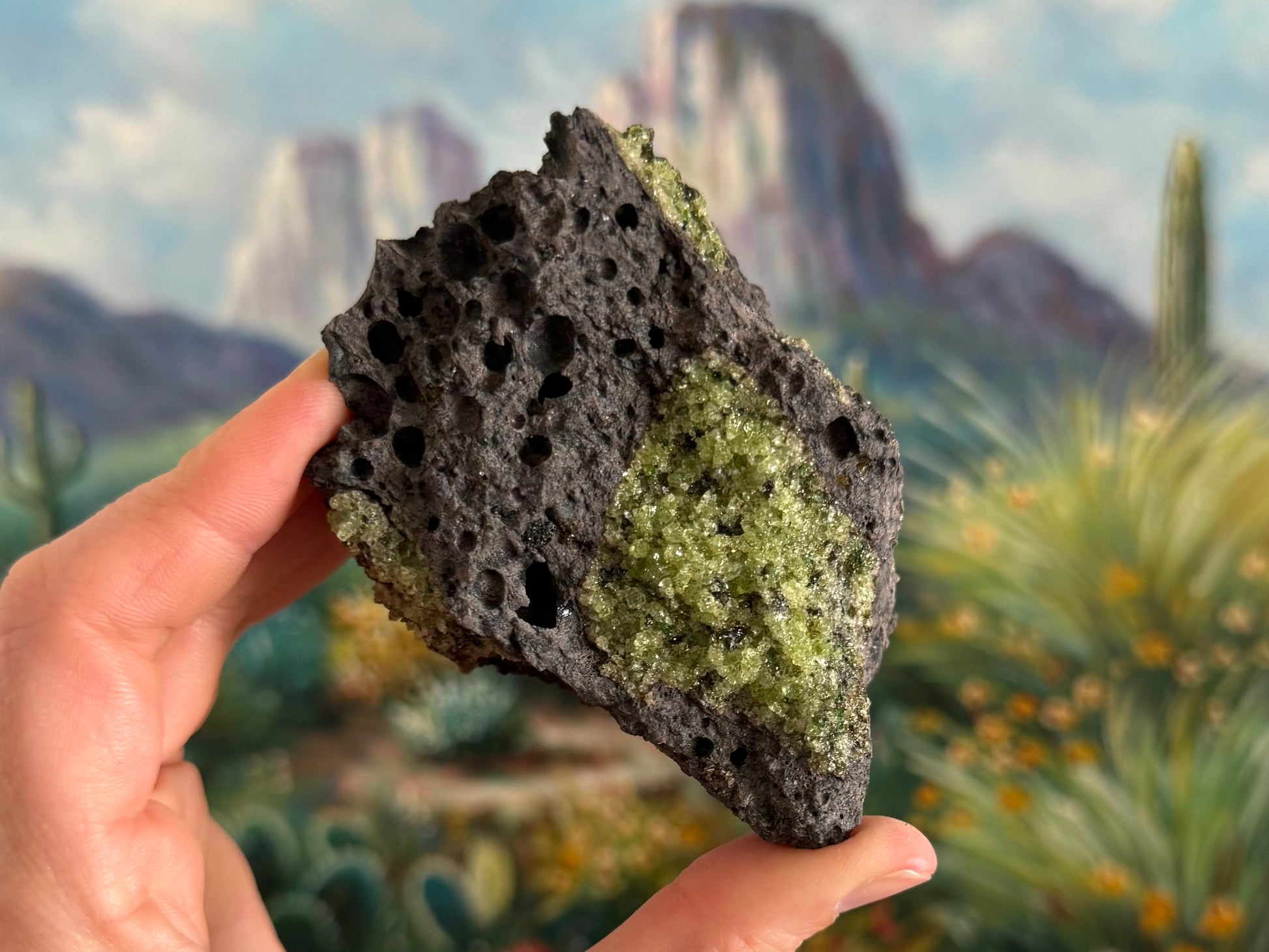 A side of the piece with nice bubble hole pattern in the volcanic rock, and a saturated green patch of peridotite