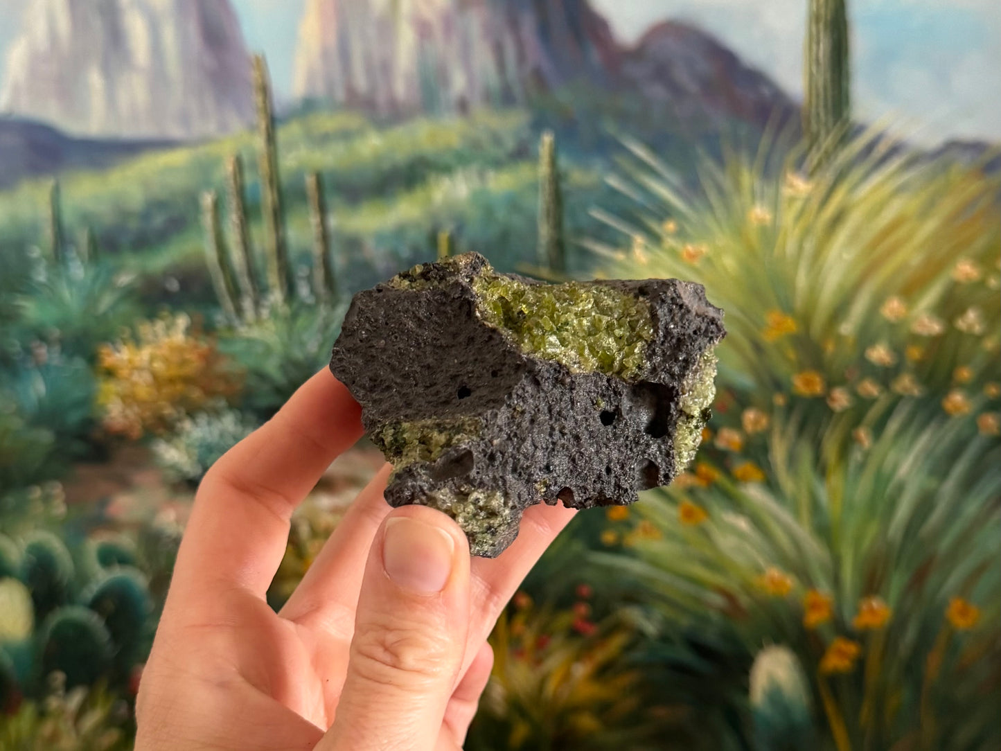 Looking down the point of the piece at the gemmy olivine patch with larger translucent crystals.