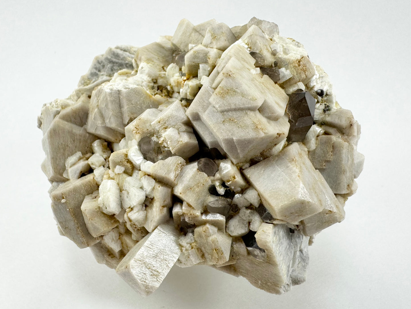 Another angle of the specimen, emphasizing the largest blocky crystals of microcline, with excellent form