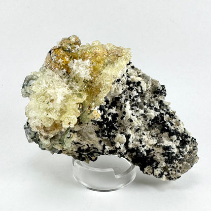 Black tourmaline in albite matrix with hyalite and minor fluorite