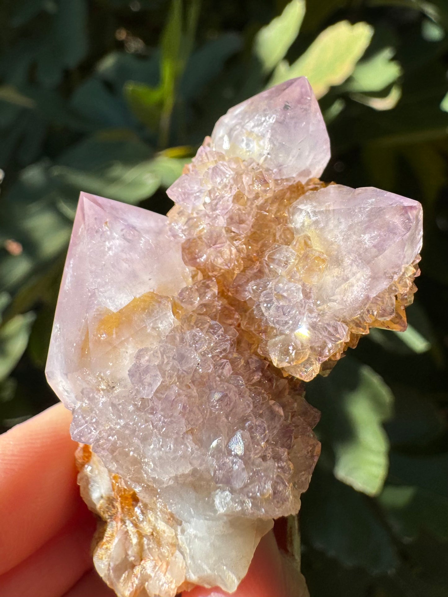 Detail of another side of the specimen without iron staining, light colored with purple tint.