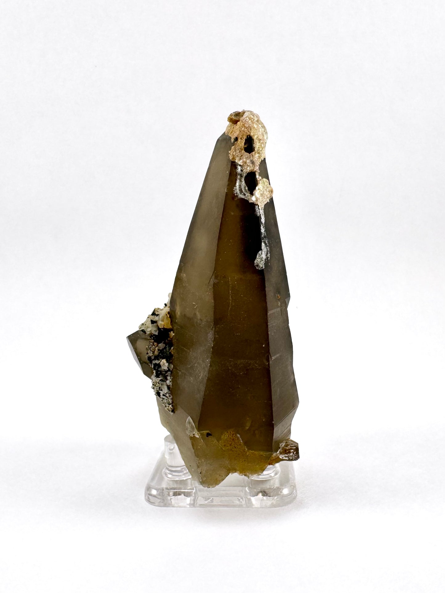 Smoky quartz point with hyalite