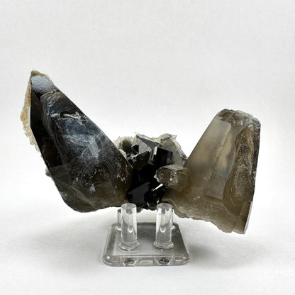 Smoky quartz and black tourmaline cluster with hyalite