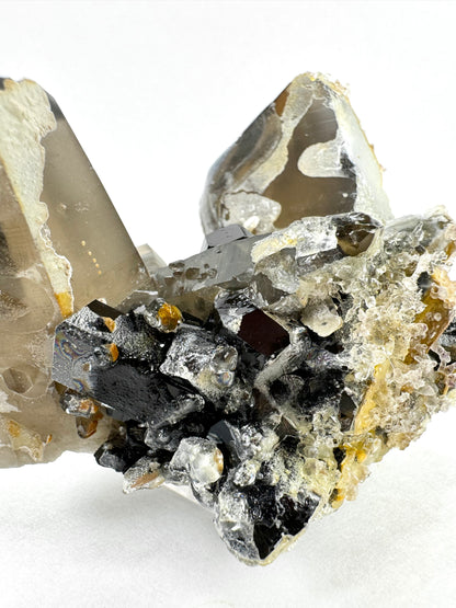 Smoky quartz and black tourmaline cluster with hyalite