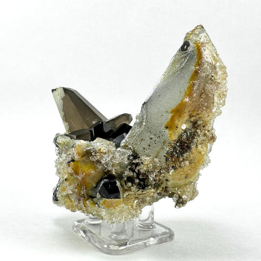 Smoky quartz and black tourmaline cluster with hyalite