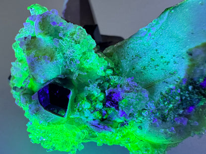 Smoky quartz and black tourmaline cluster with hyalite