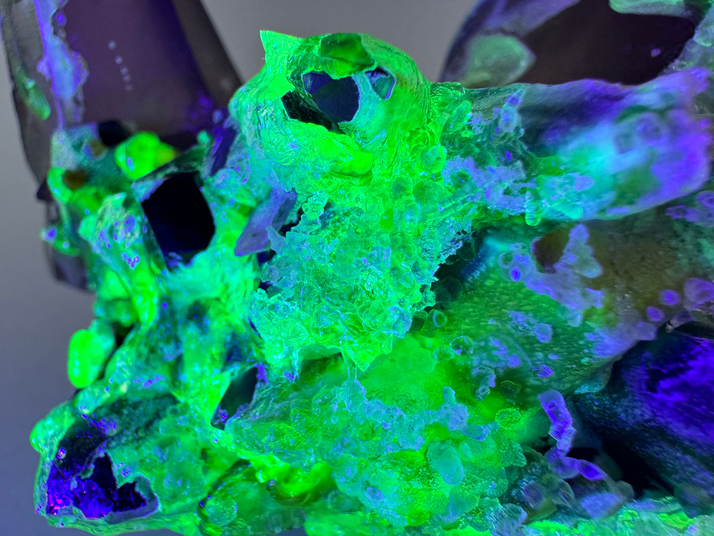 Smoky quartz and black tourmaline cluster with hyalite