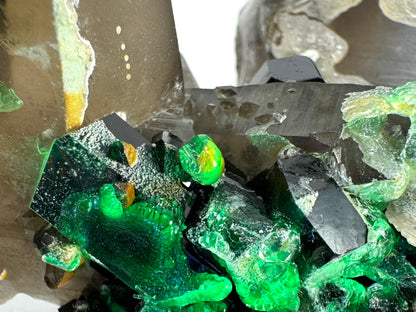 Smoky quartz and black tourmaline cluster with hyalite