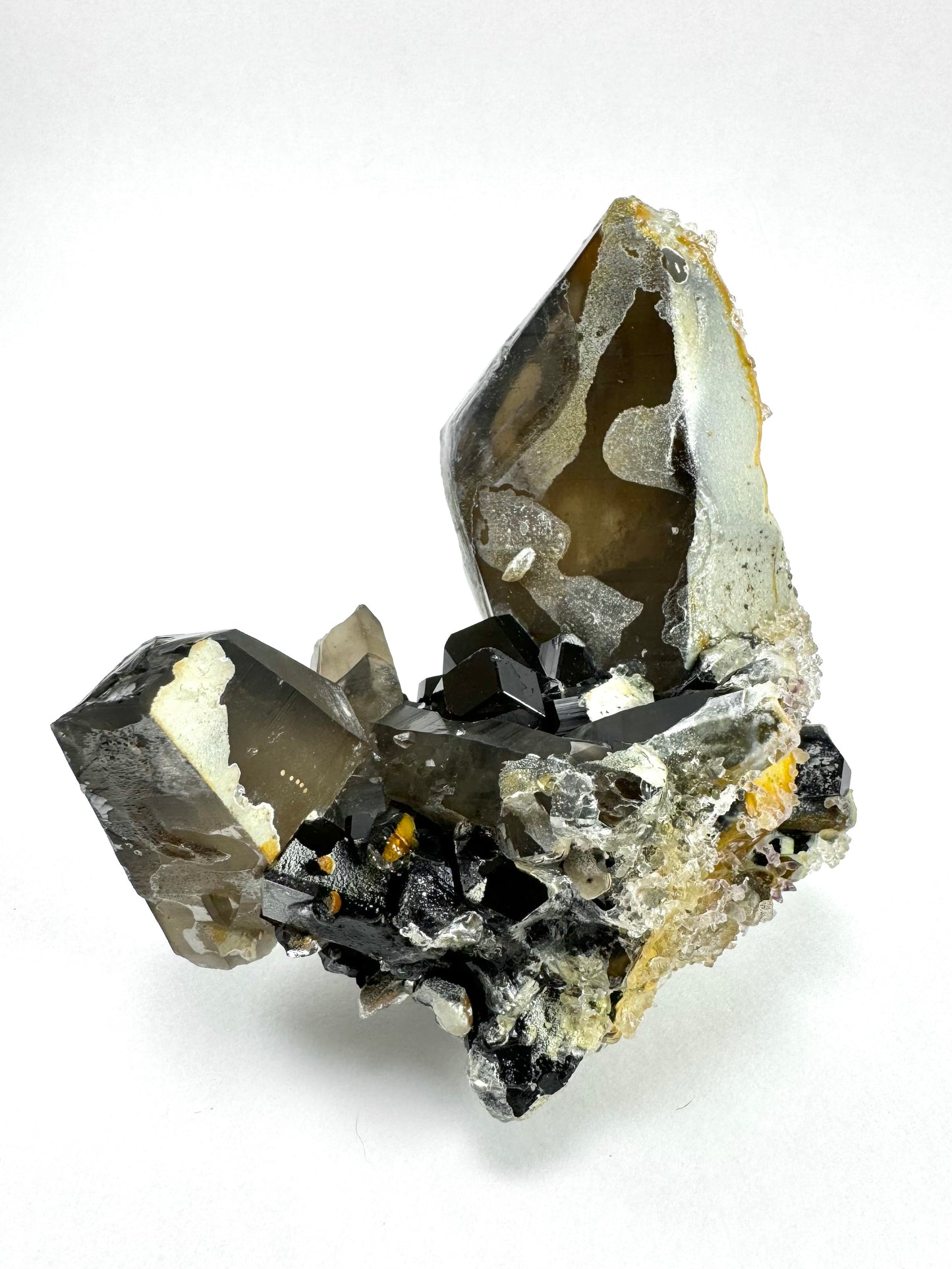 Smoky quartz and black tourmaline cluster with hyalite