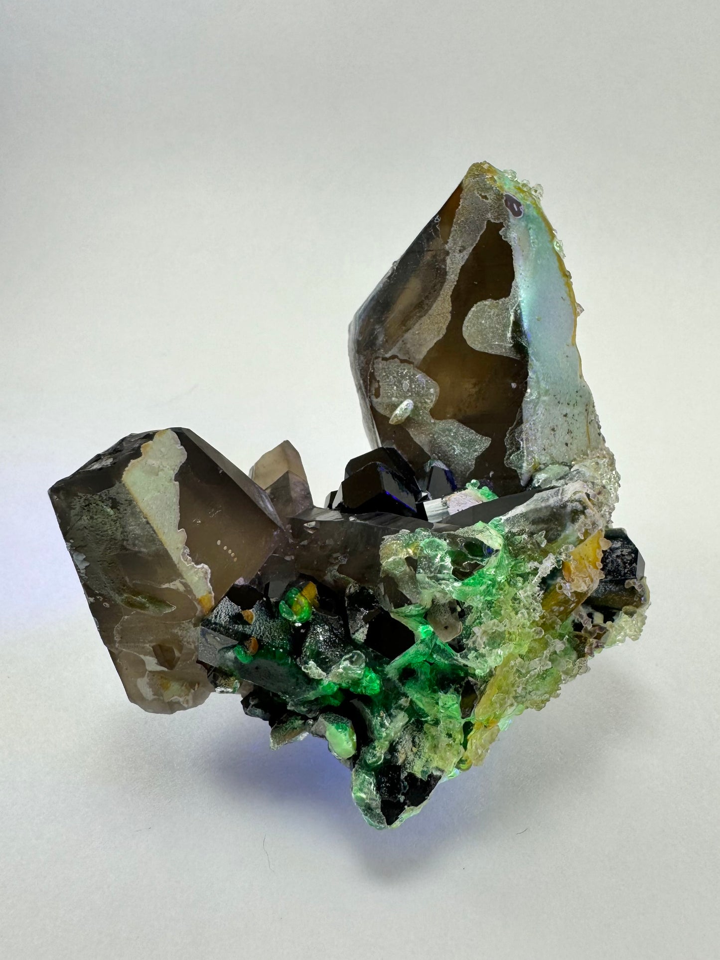 Smoky quartz and black tourmaline cluster with hyalite