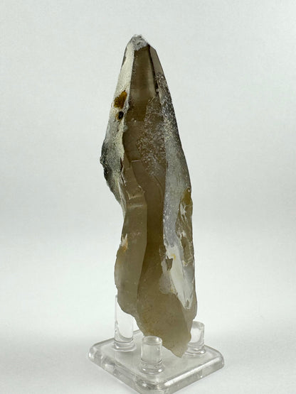 An unusually-shaped face of the point between the hyalite and filmy sides. It is long and thin but tapers down in the middle like an hourglass.