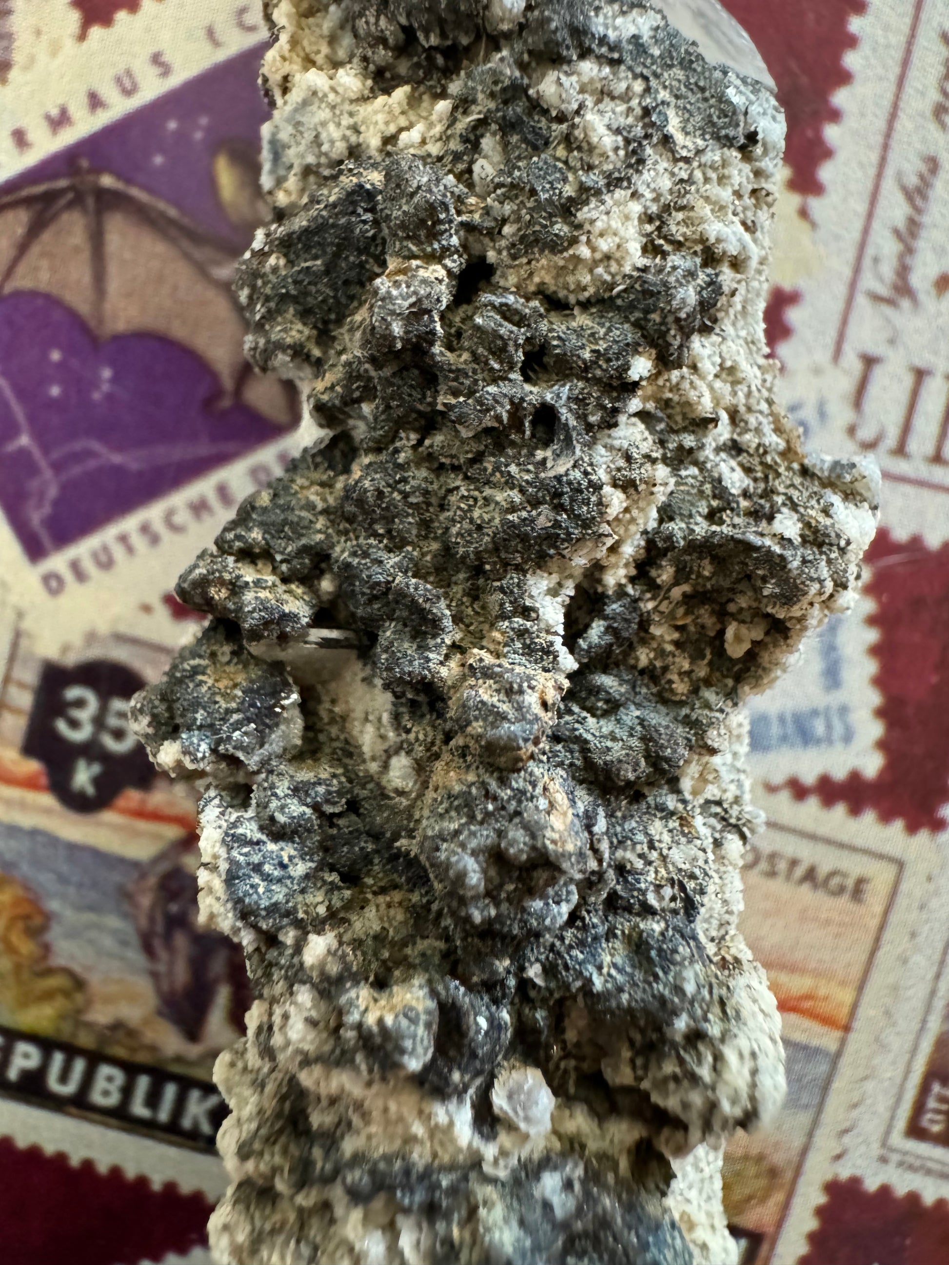 Detail of the mineral aggregate, made of lumpy dull black and light minerals