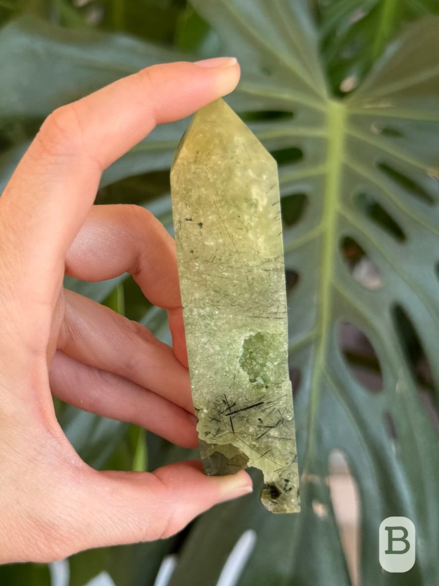 Option B, another side of the tower showing the base is fairly hollow and the prehnite has a fine granular texture.