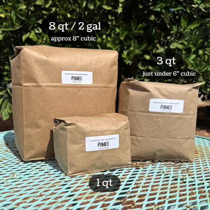 Three brown paper bags of different sizes filled with pumice, demonstrating the three size options. The smallest is one quart, the medium size is three quarts and labeled as just under six inches cubic. The largest is eight quarts or 2 gallons, and labeled as approximately eight cubic inches.