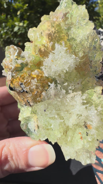 Black tourmaline in albite matrix with hyalite and minor fluorite